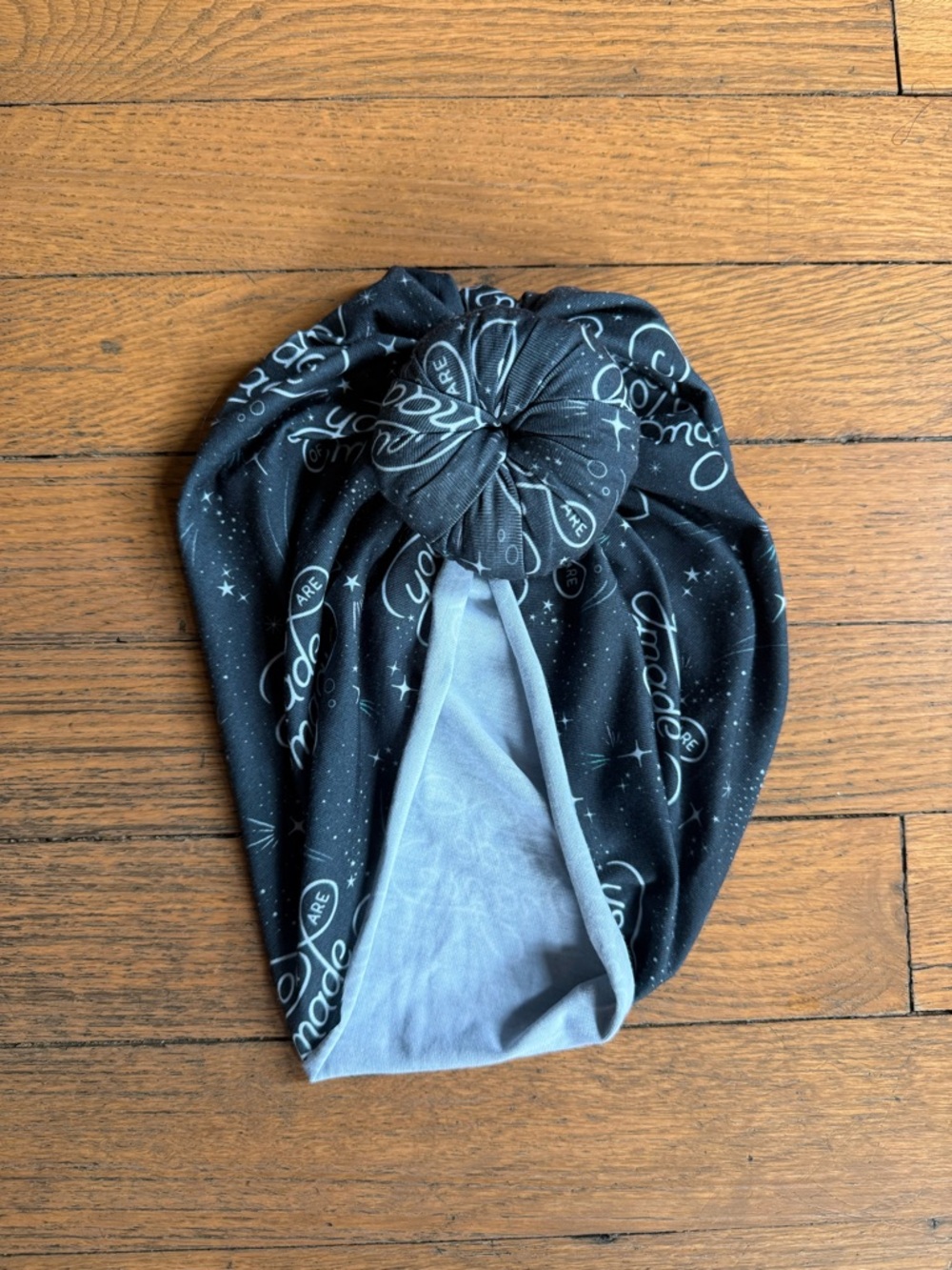 Adult Black Knot Turban with Script Print(you are made of magic)